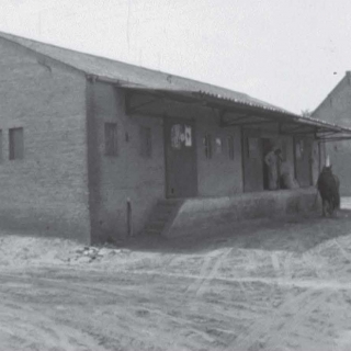 053-Boerenbond,  Kerkeind Milheeze. Dit gebouw heette vroeger ’t Pakhuis. Het is afgebroken in de 80-er jaren van de vorige eeuw. Foto uit 1958.